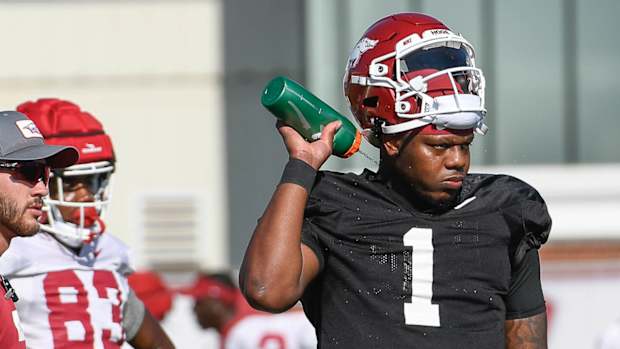 Razorbacks quarterback KJ Jefferson during Tuesday's practice outdoors in Fayetteville